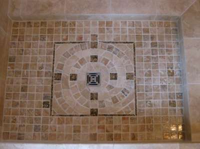 Custom Bathroom Design on Floor Of Shower With Custom Swirl Design